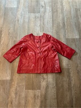 Red Faux Leather Jacket with Pockets and Button Front. Size: L